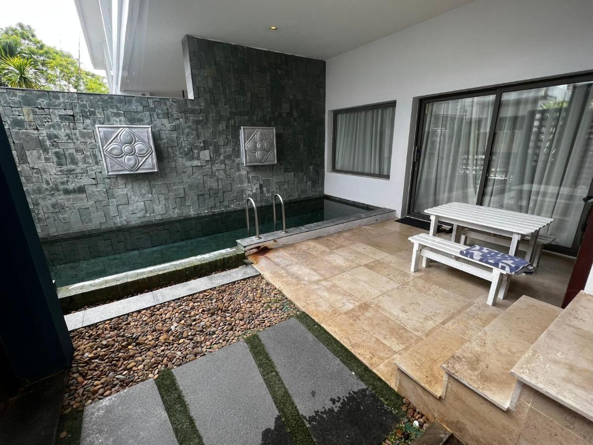 The Nchantra Beachfront Resort Phuket Exterior photo