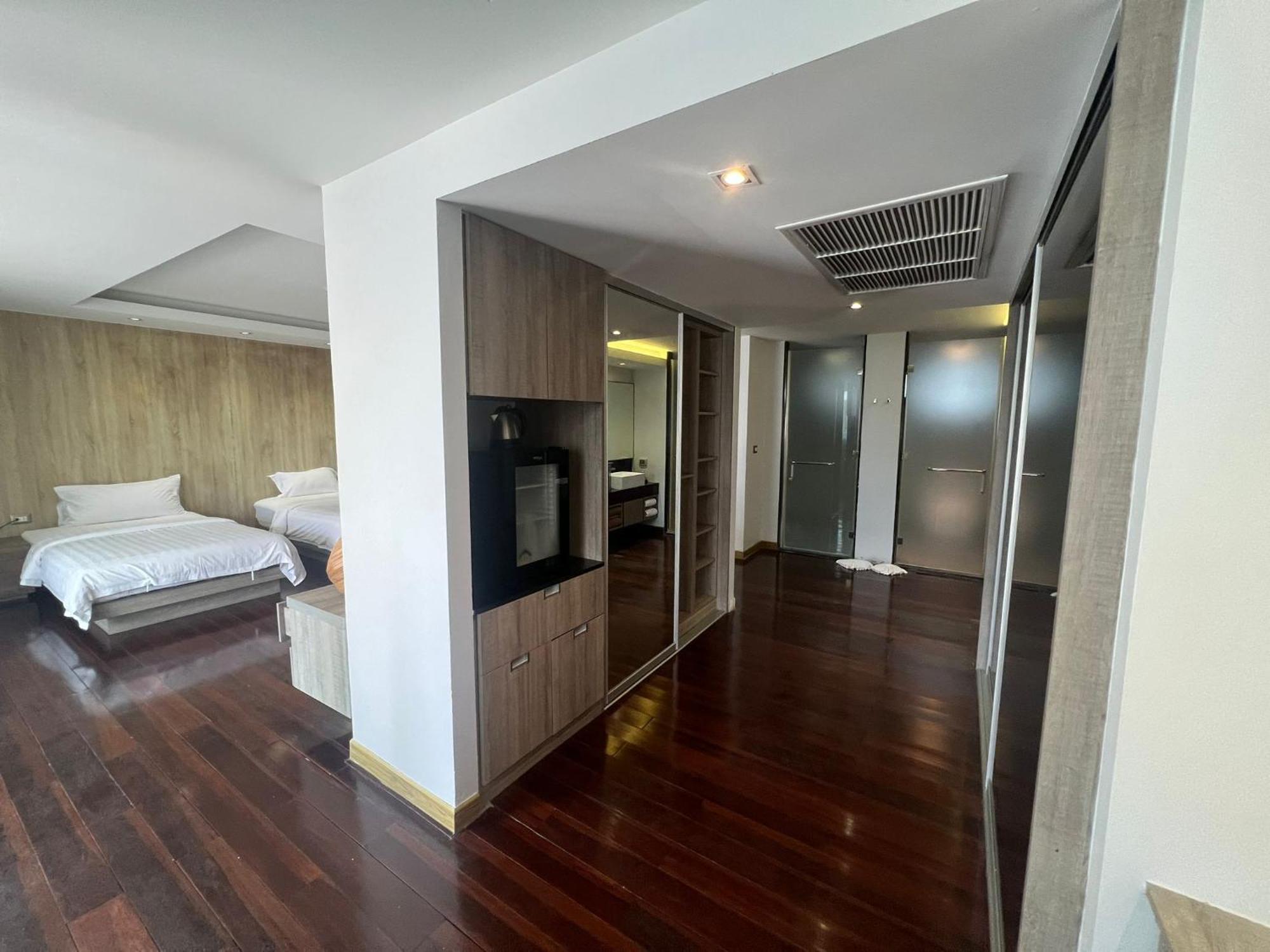 The Nchantra Beachfront Resort Phuket Exterior photo
