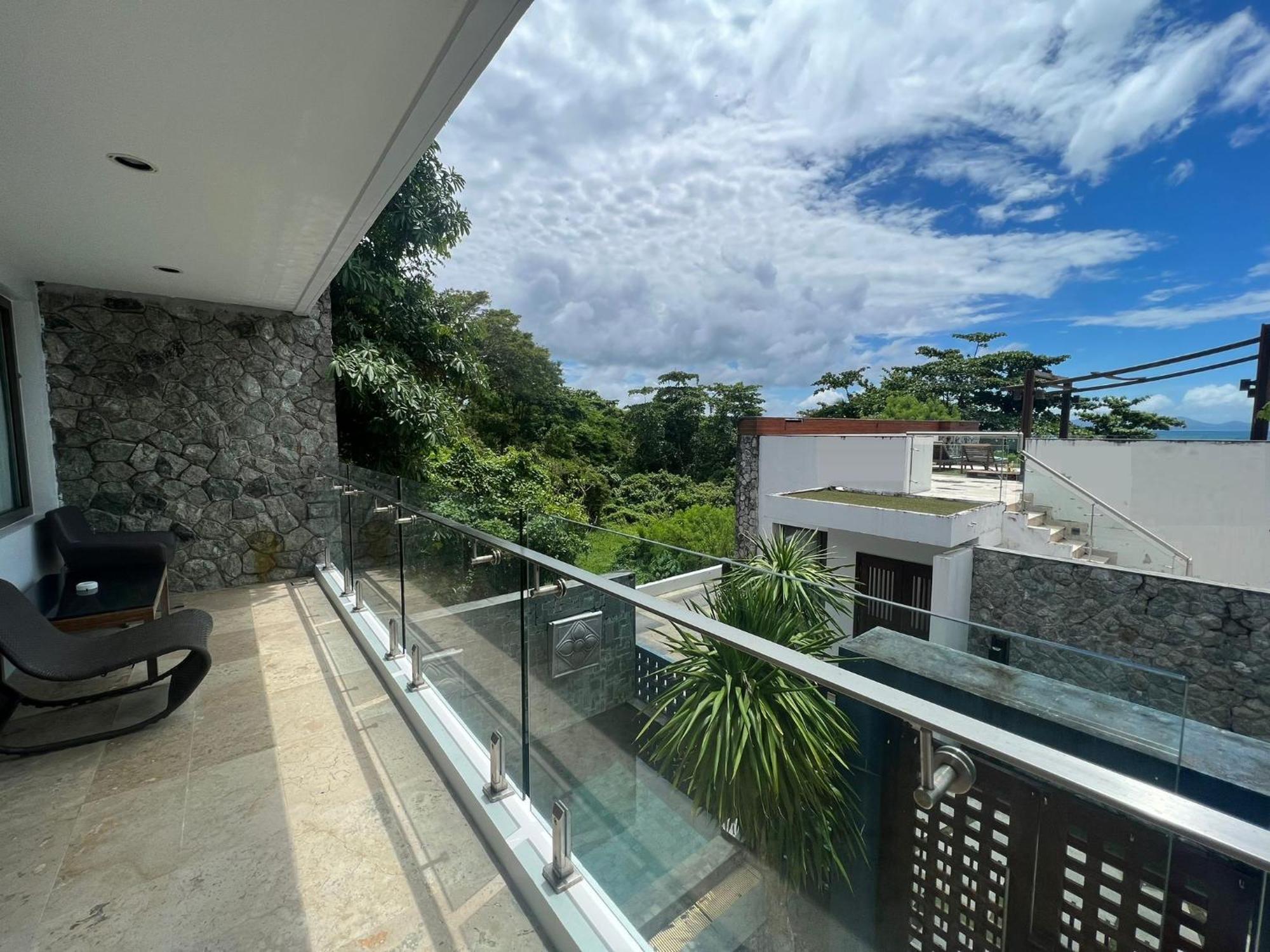 The Nchantra Beachfront Resort Phuket Exterior photo