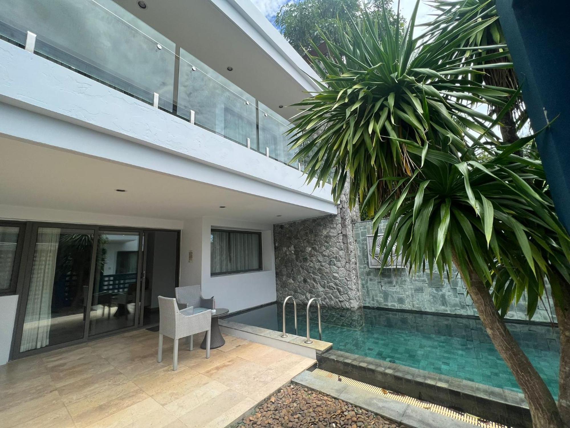 The Nchantra Beachfront Resort Phuket Exterior photo