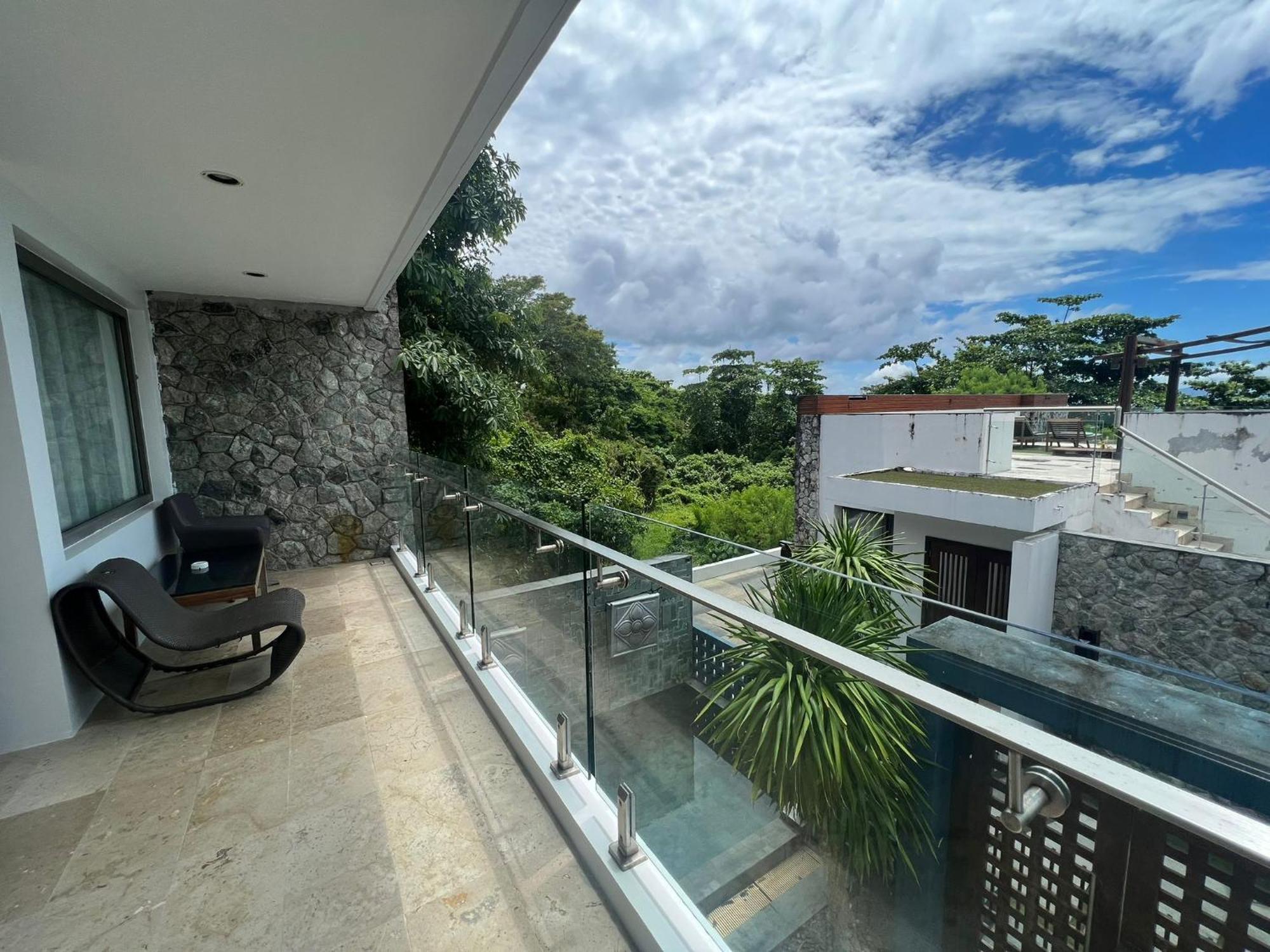 The Nchantra Beachfront Resort Phuket Exterior photo