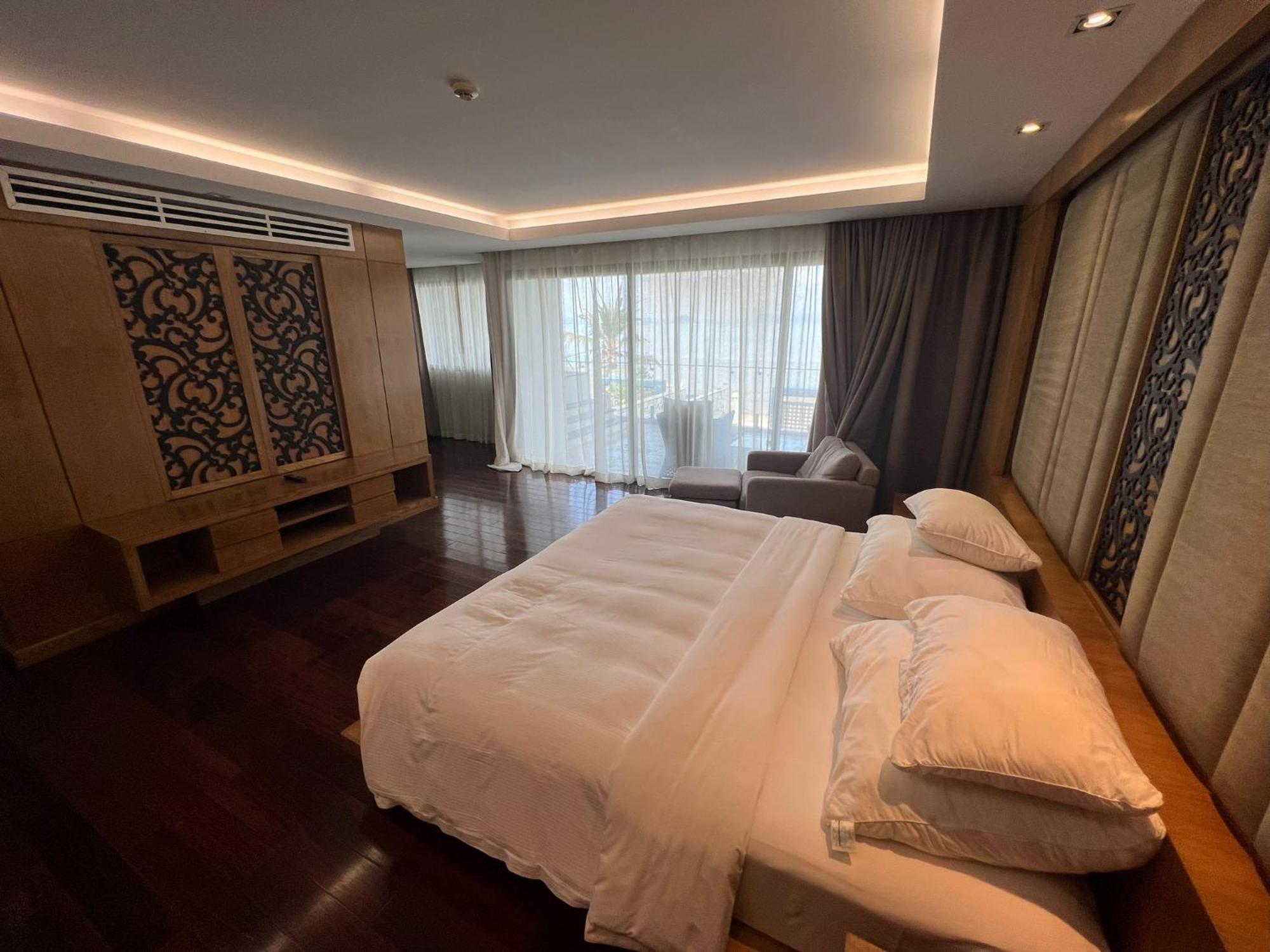 The Nchantra Beachfront Resort Phuket Exterior photo