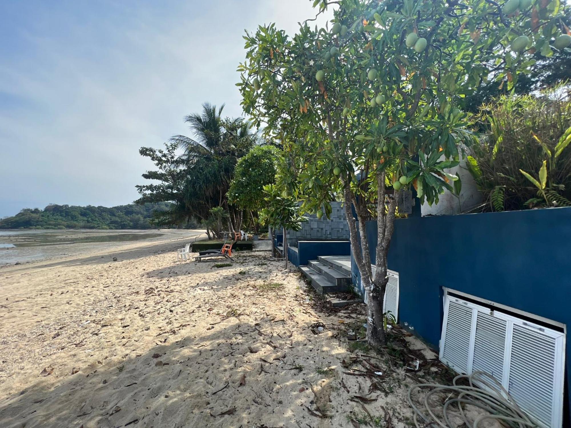 The Nchantra Beachfront Resort Phuket Exterior photo