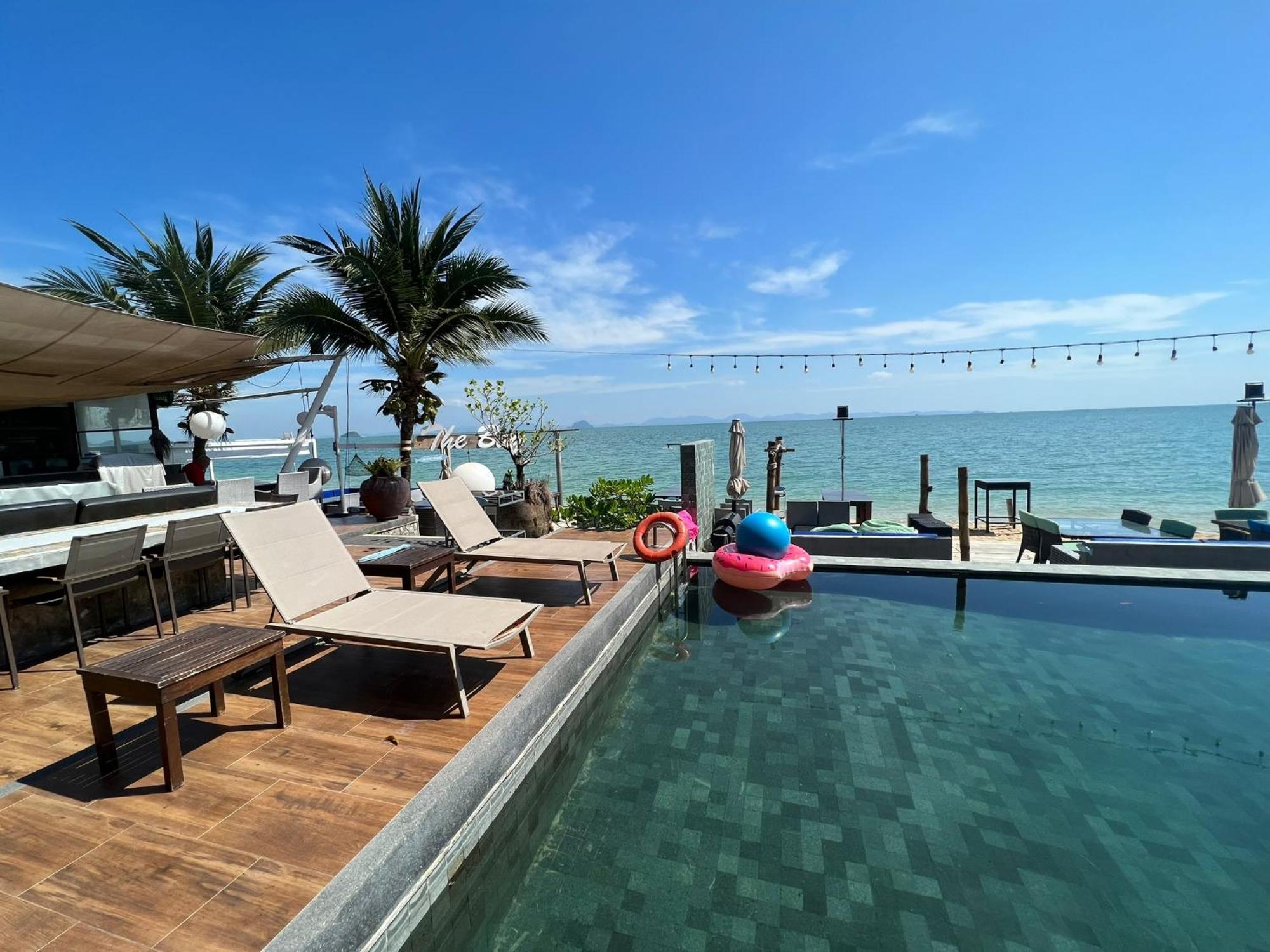 The Nchantra Beachfront Resort Phuket Exterior photo