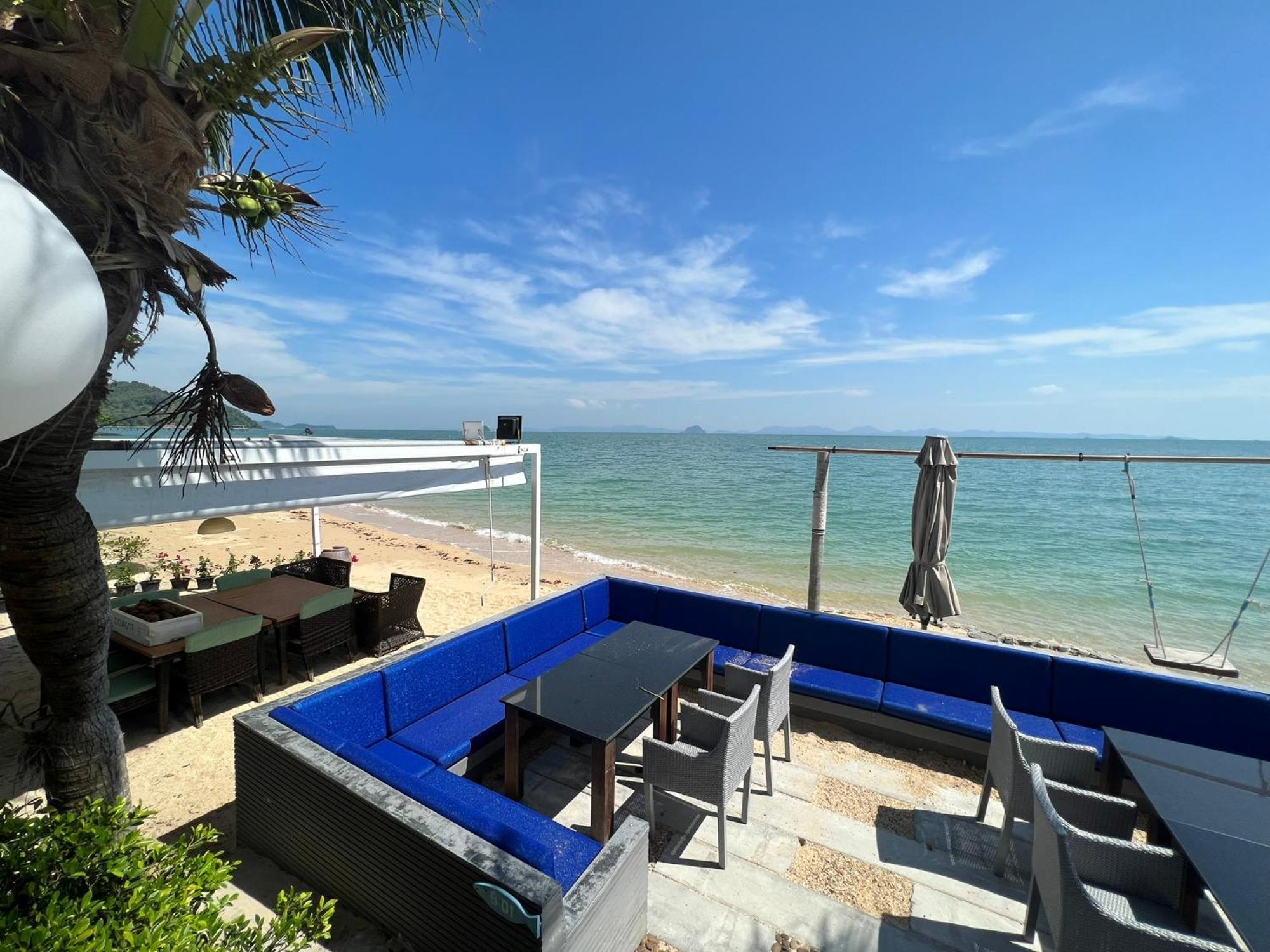 The Nchantra Beachfront Resort Phuket Exterior photo