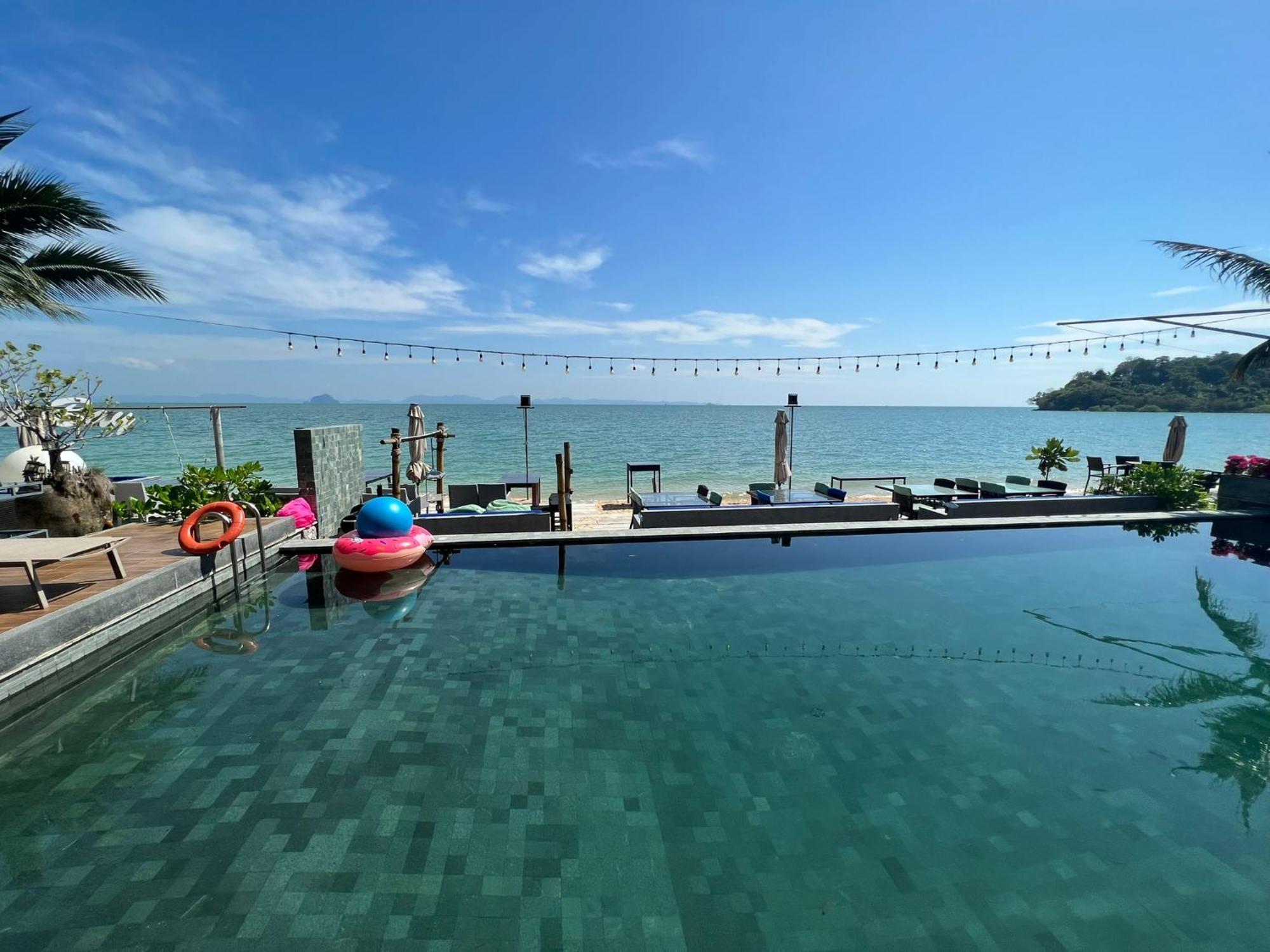 The Nchantra Beachfront Resort Phuket Exterior photo