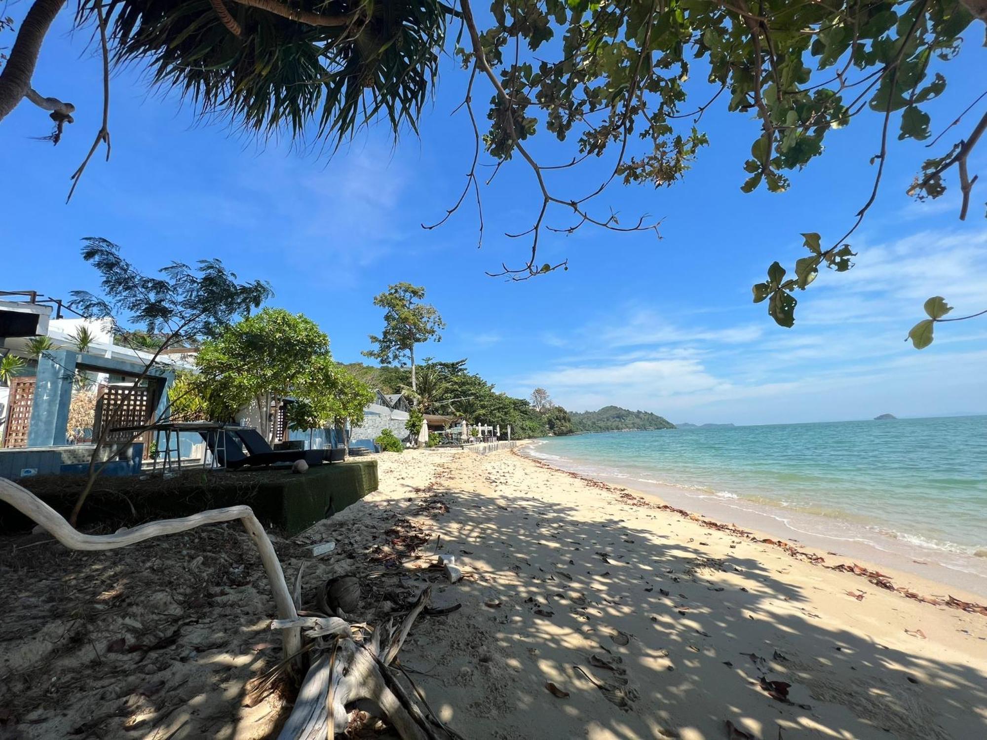 The Nchantra Beachfront Resort Phuket Exterior photo