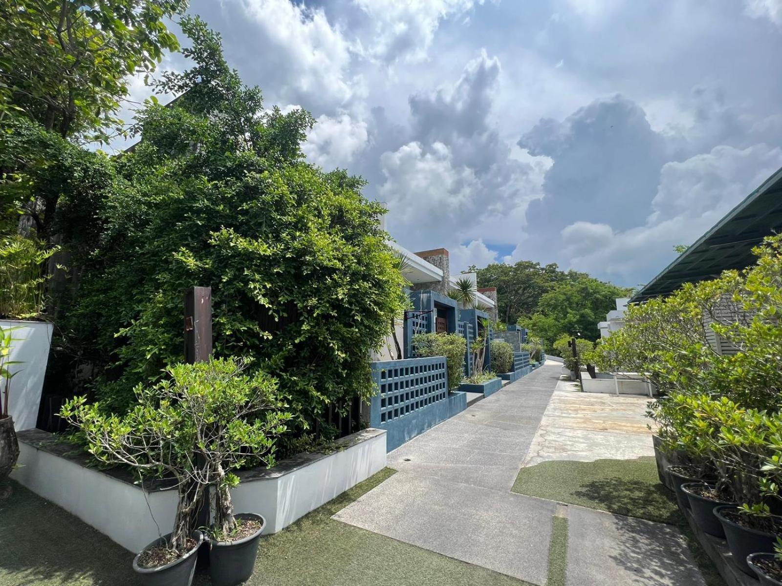 The Nchantra Beachfront Resort Phuket Exterior photo