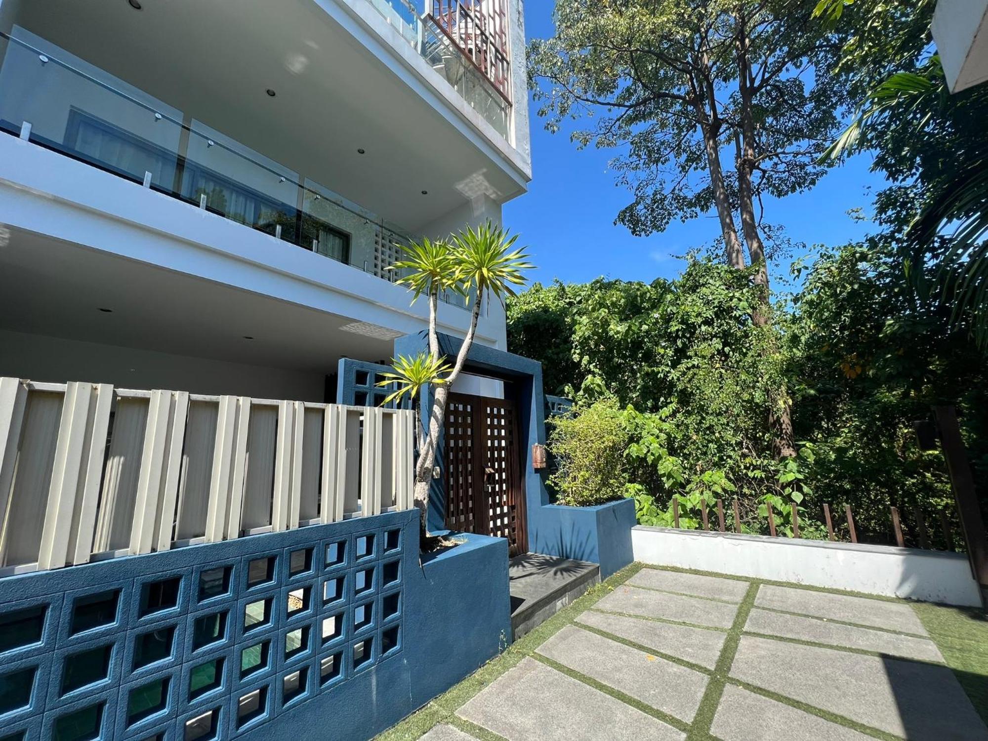 The Nchantra Beachfront Resort Phuket Exterior photo