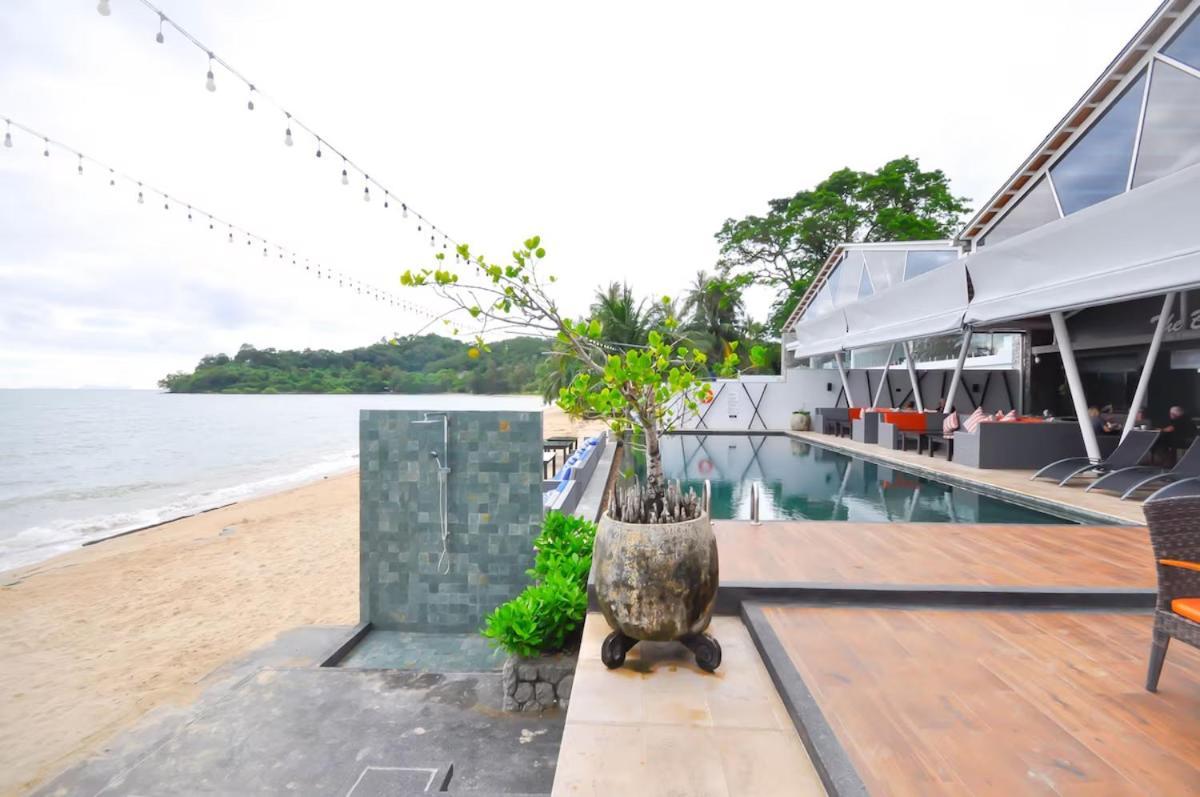 The Nchantra Beachfront Resort Phuket Exterior photo