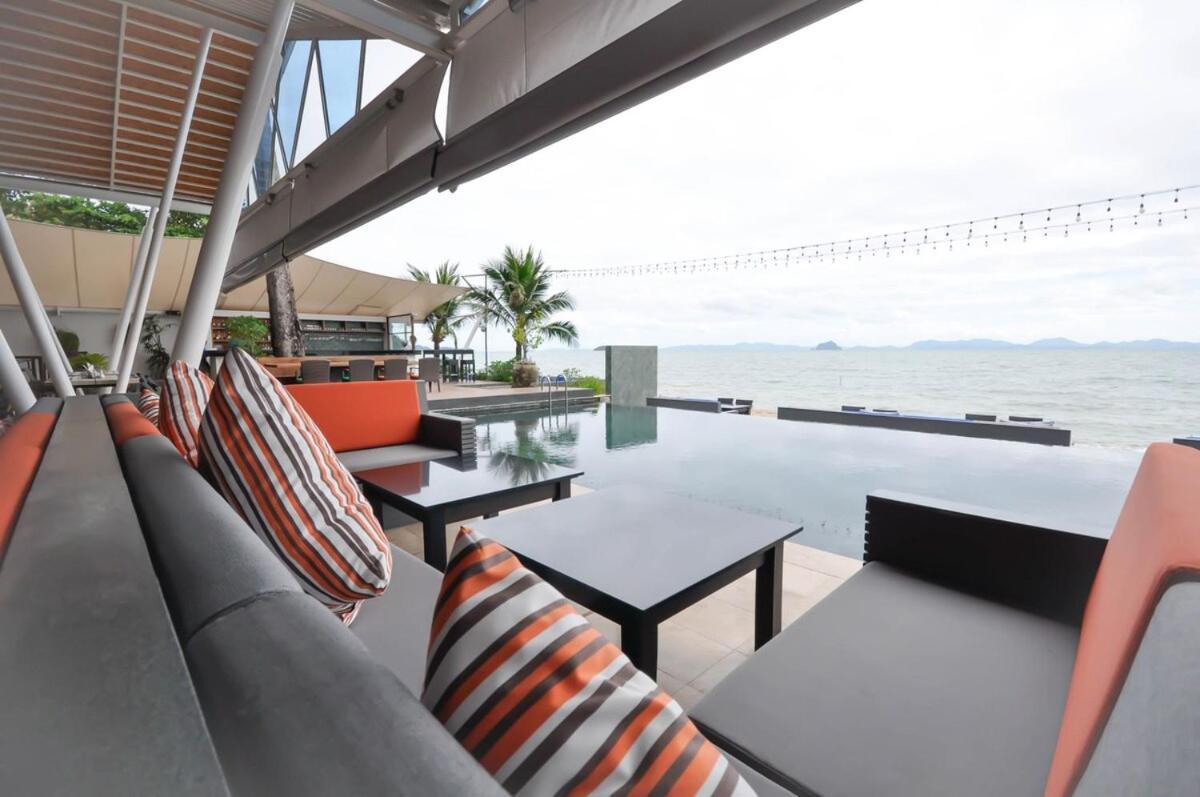 The Nchantra Beachfront Resort Phuket Exterior photo