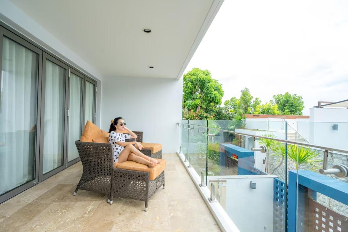 The Nchantra Beachfront Resort Phuket Exterior photo