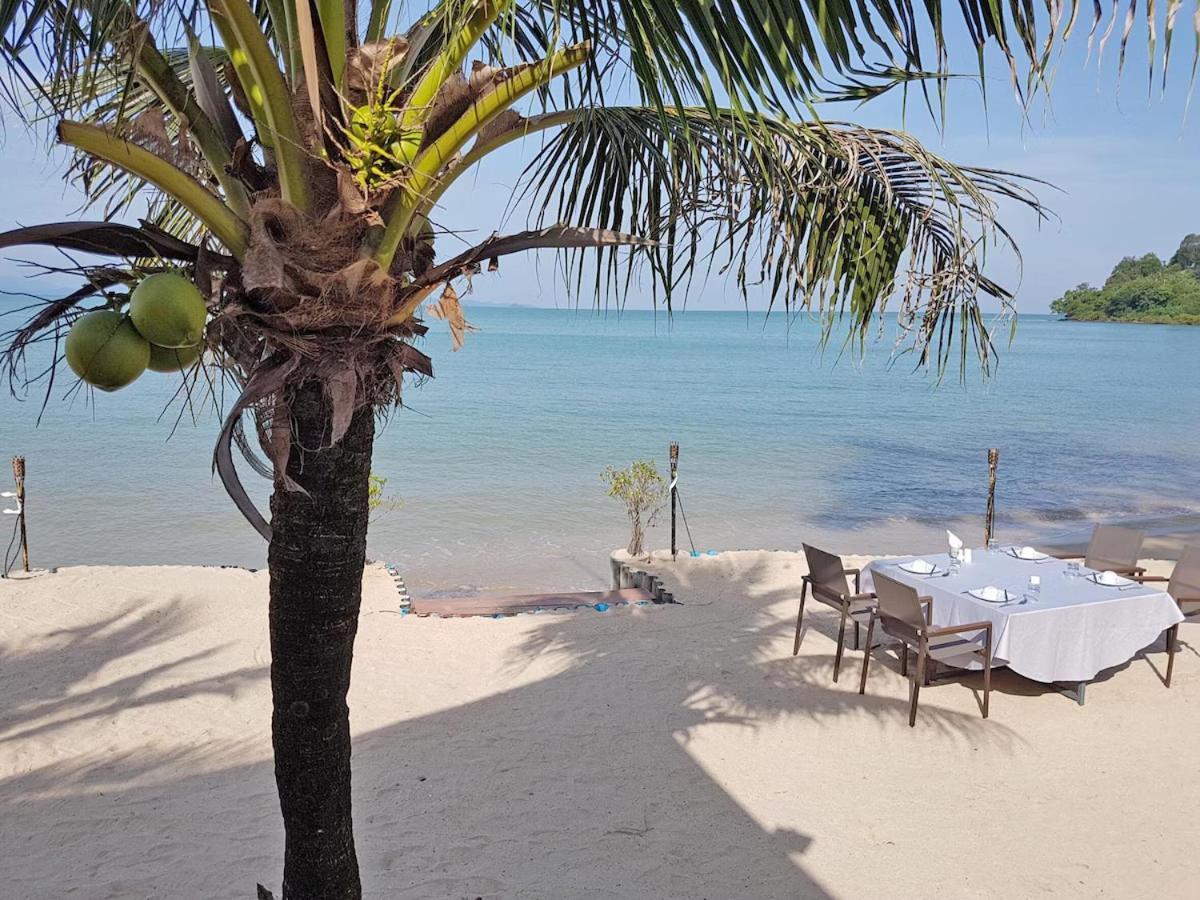 The Nchantra Beachfront Resort Phuket Exterior photo